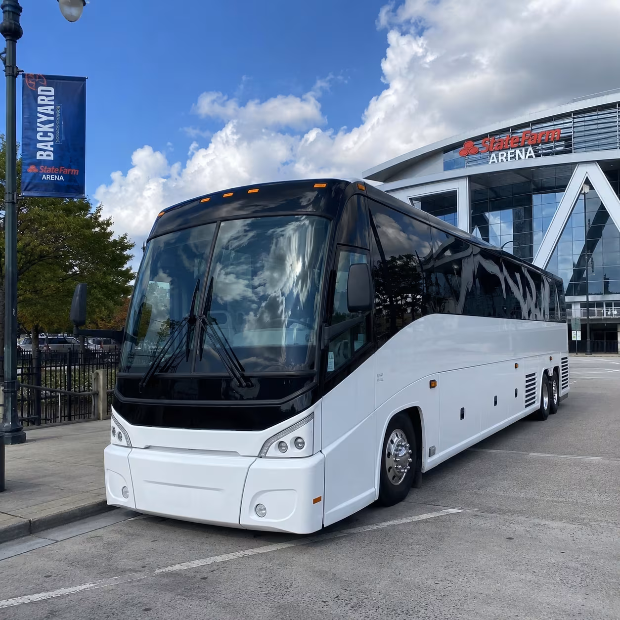 Black minibus shuttle parked outdoors for a Atlanta group trip