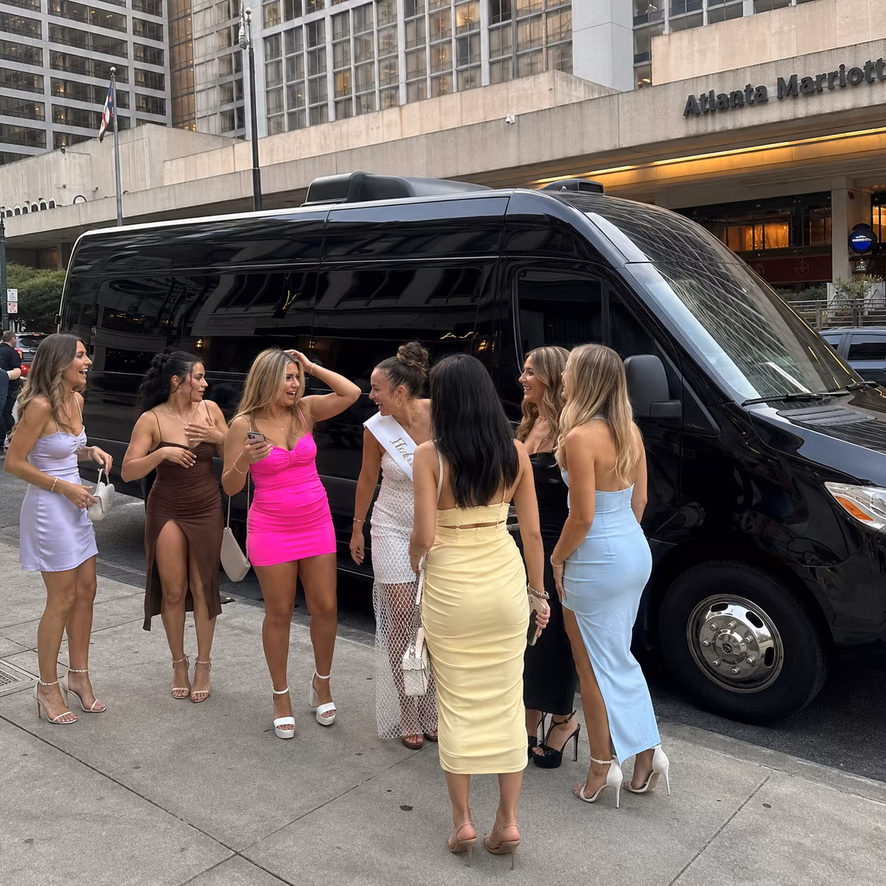Grech GM24 hotel boarding for a metro Atlanta bachelor & bachelorette party bus rental