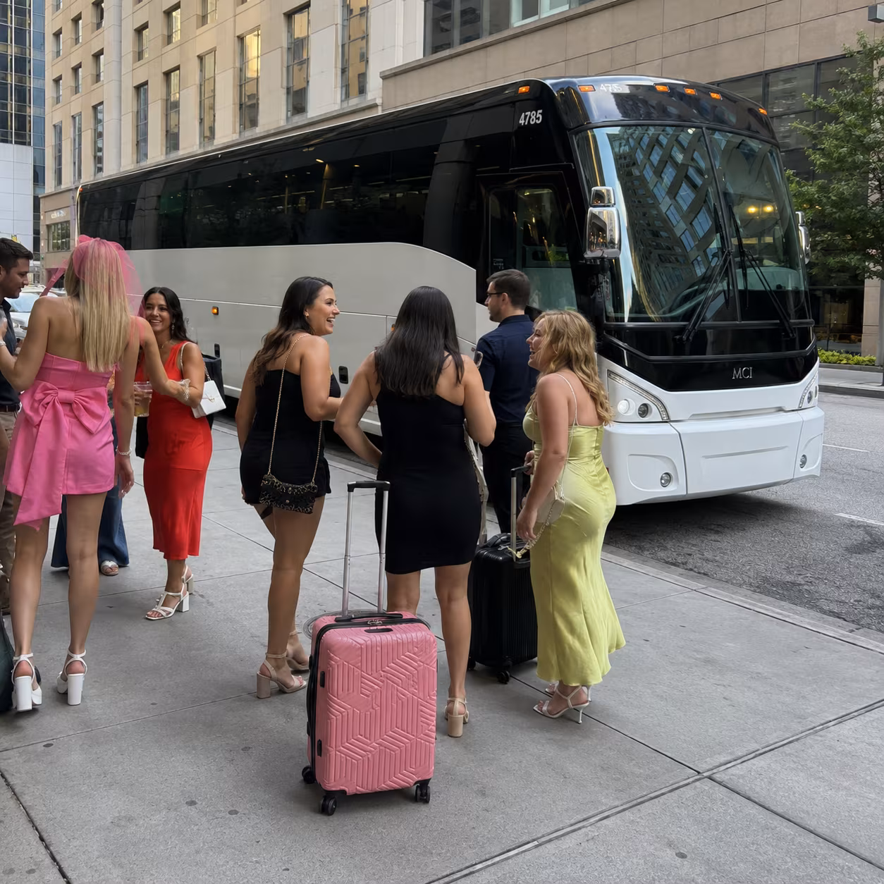 MCI j4500 hotel block loading for a metro Atlanta bachelor & bachelorette party bus rental