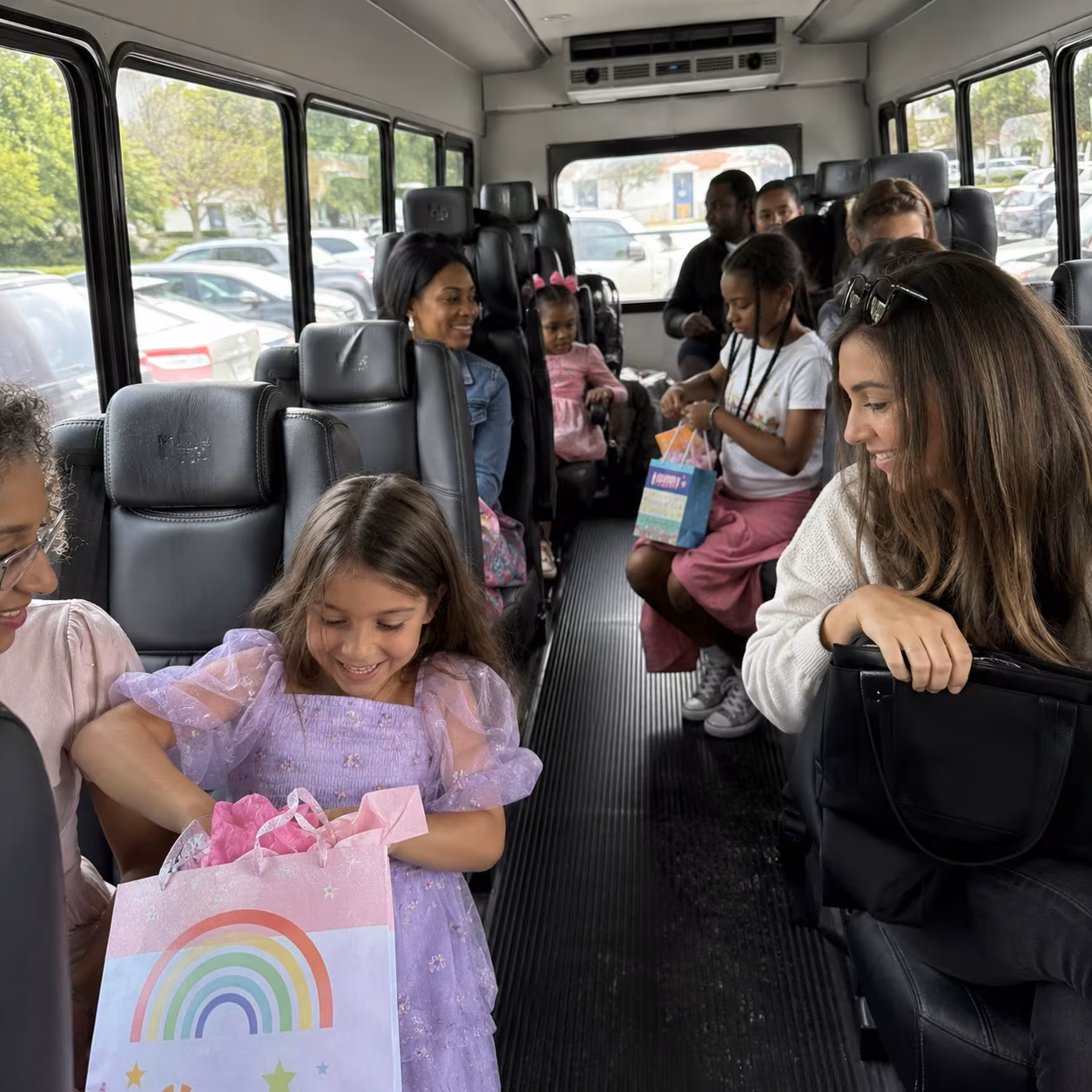 Kids minibus interior gift bags for a metro Atlanta birthday party bus rental