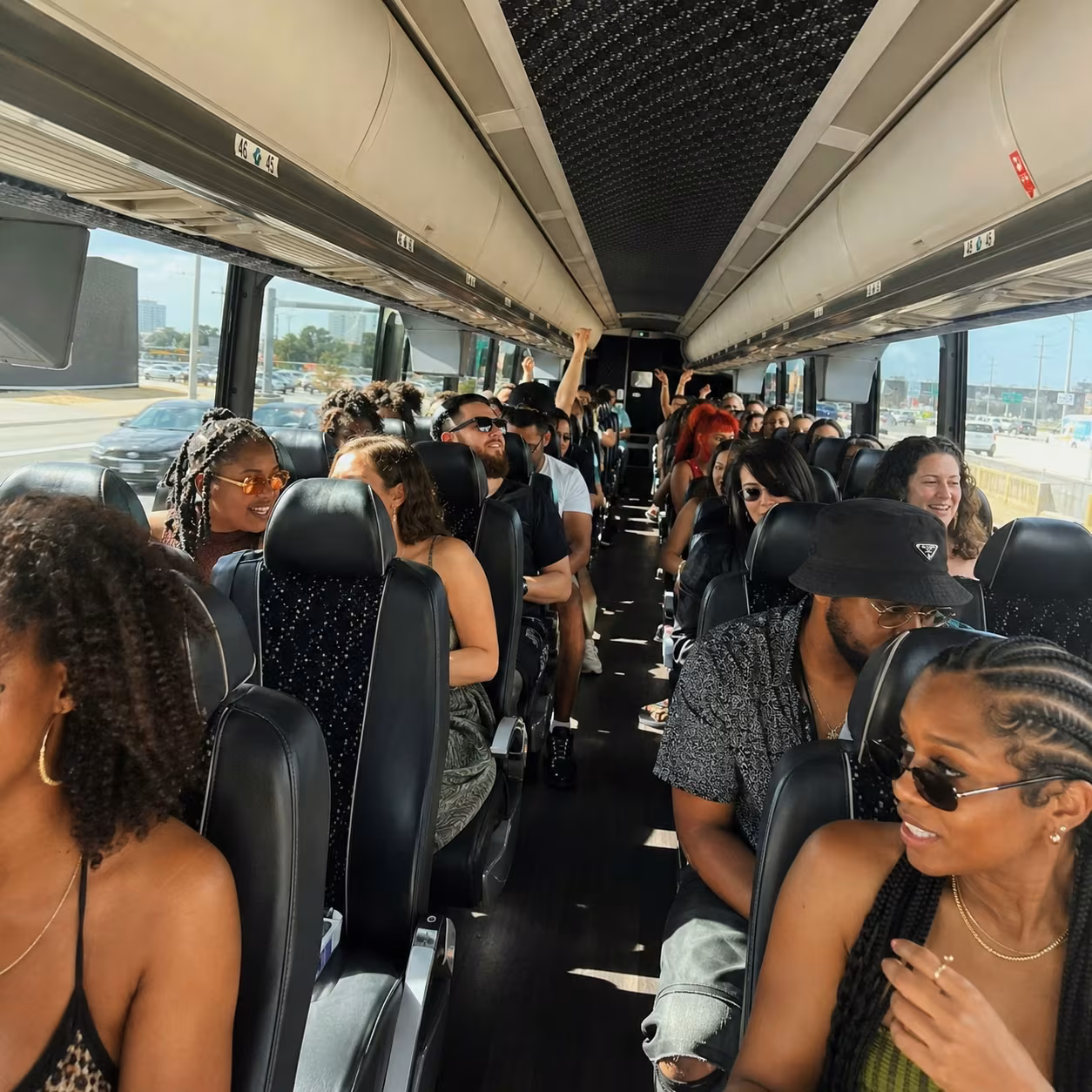 MCI j4500 interior aisle for a metro Atlanta concert party bus rental