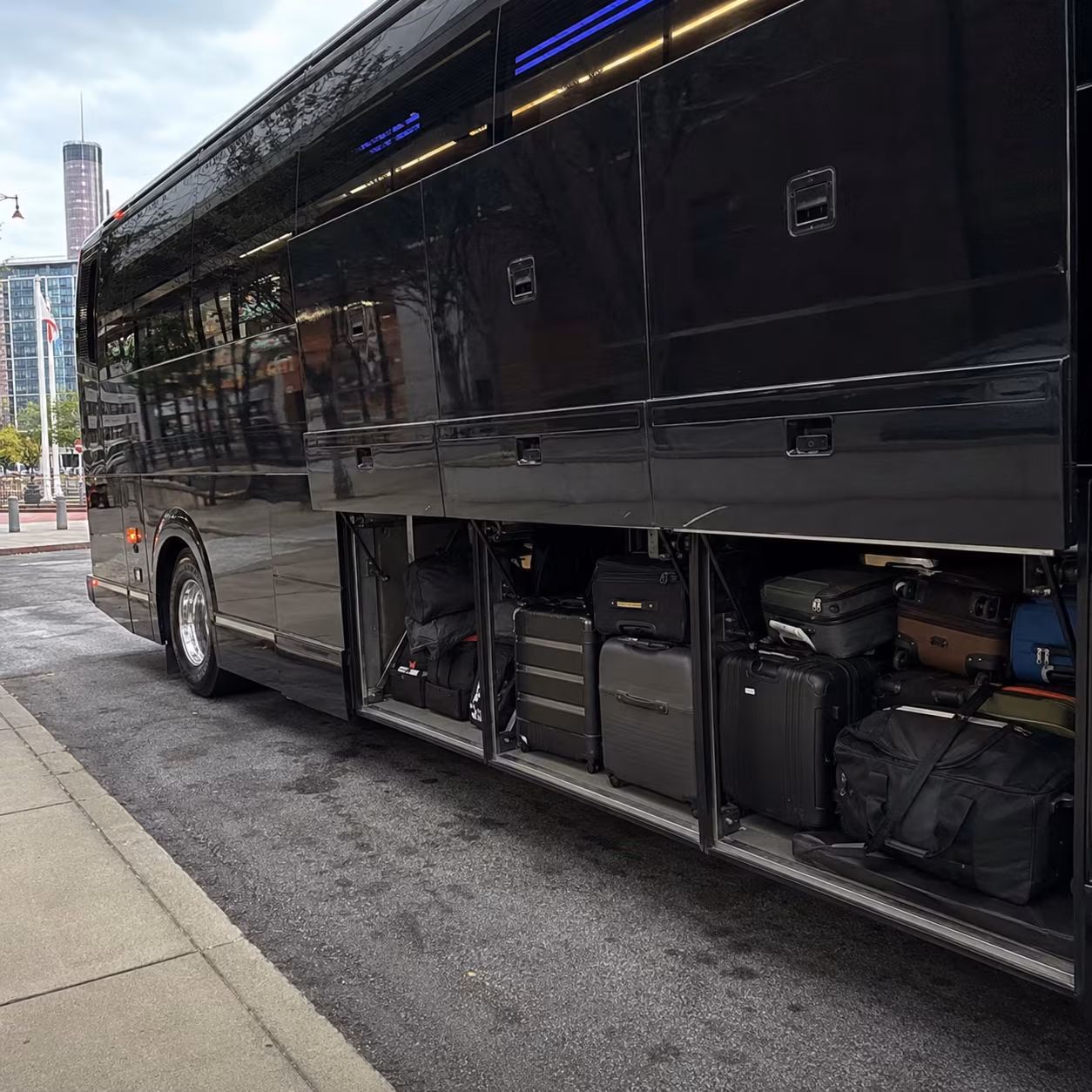 Corporate event transportation party bus luggage bay for a metro Atlanta corporate event party bus rental