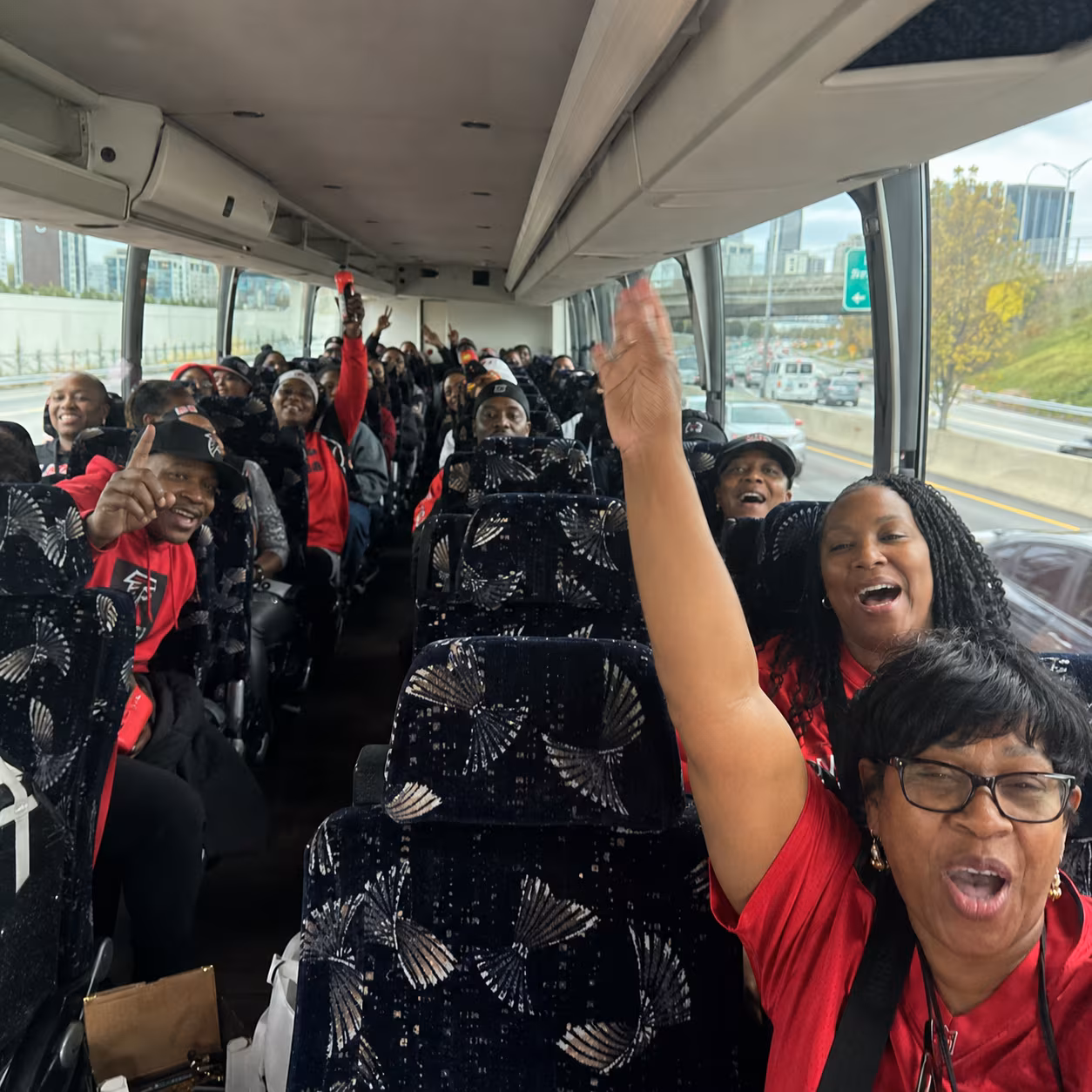 Sporting event bus charter bus interior seating for a metro Atlanta sporting event party bus rental