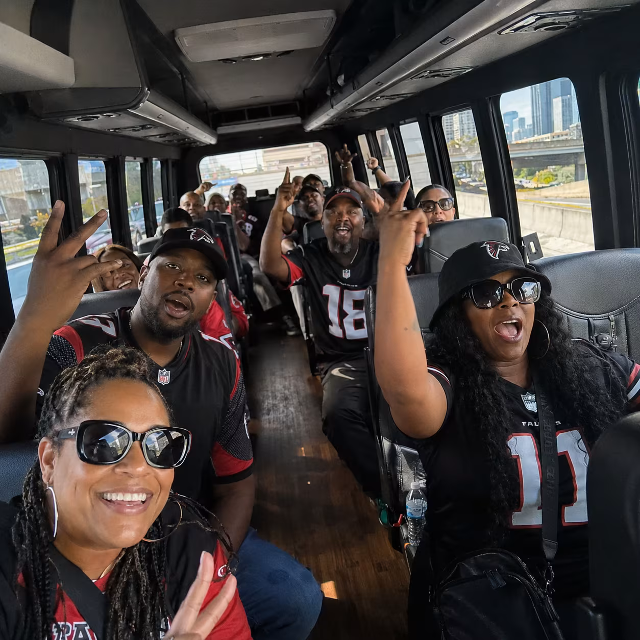 Sporting event bus minibus interior seating for a metro Atlanta sporting event party bus rental