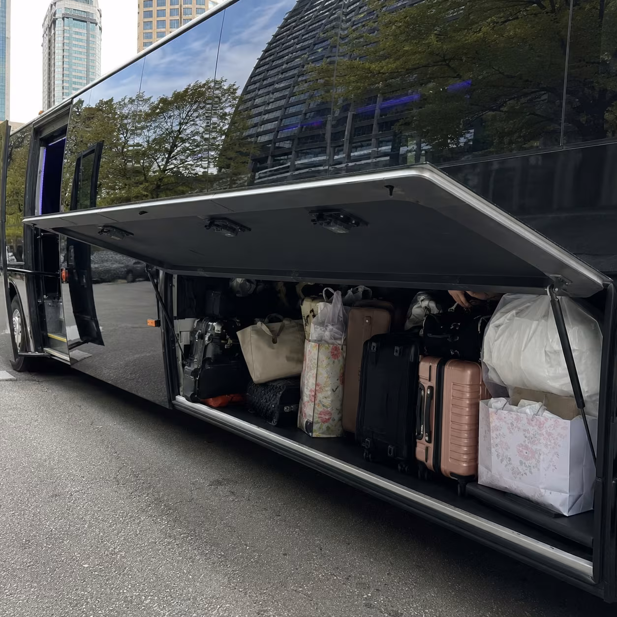 Wedding transportation party bus luggage bay for a metro Atlanta wedding party bus rental